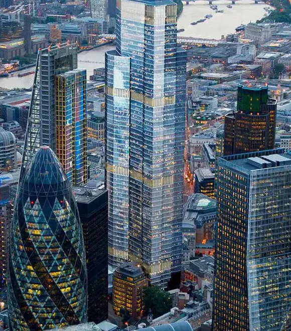 London skyline with modern skyscrapers at dusk.