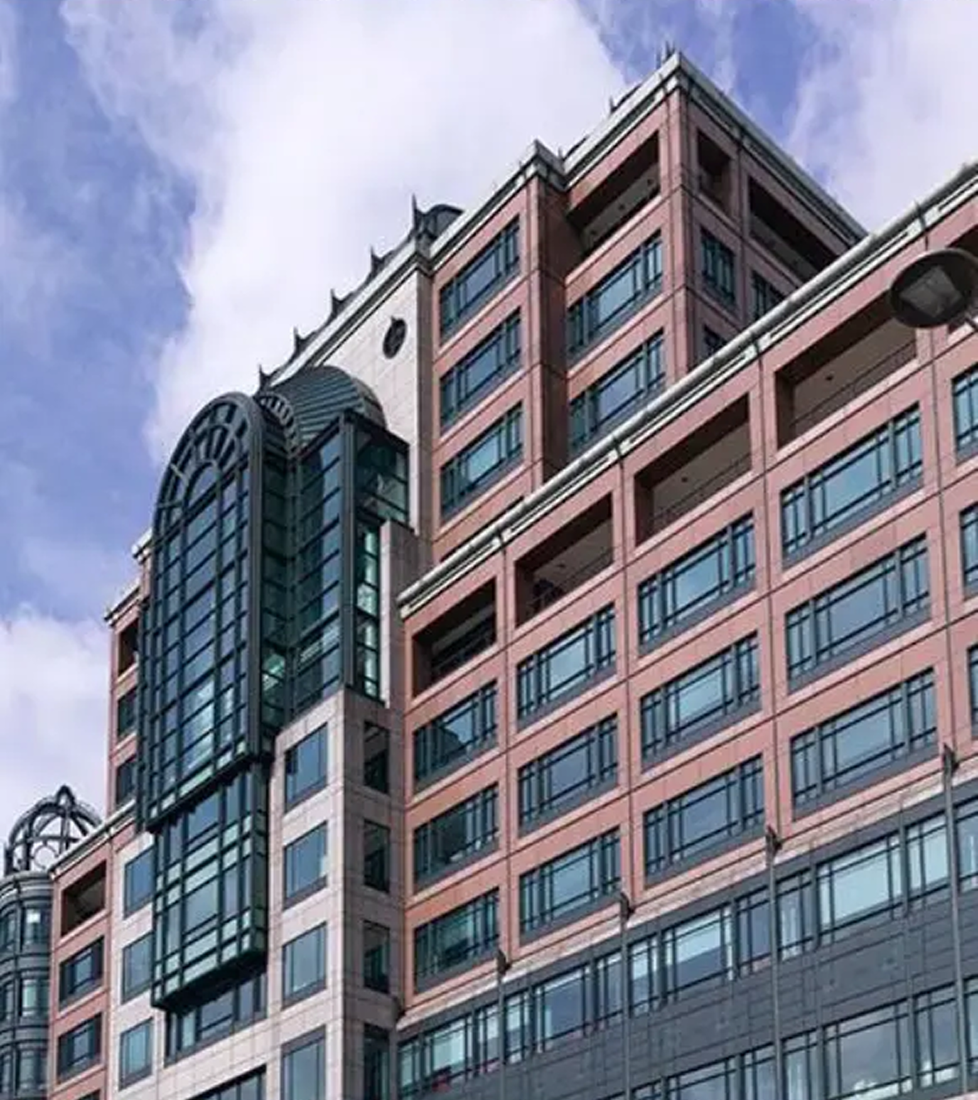 Modern office building with glass windows exterior.